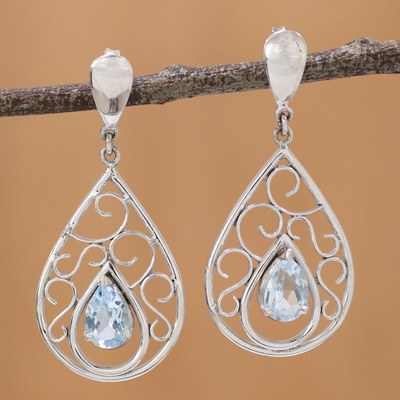 Blue topaz dangle earrings, 'Inspired Elegance' - Rhodium Plated Silver and Blue Topaz Dangle Earrings