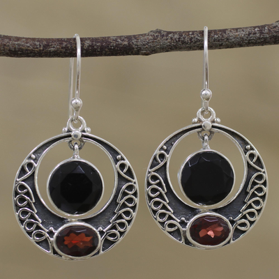 Onyx and garnet dangle earrings, 'Dancing Loops' - Onyx and Garnet Circular Dangle Earrings from India