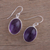 Amethyst dangle earrings, 'Glowing Delight' - Oval Amethyst and Silver Dangle Earrings from India
