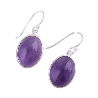 Amethyst dangle earrings, 'Glowing Delight' - Oval Amethyst and Silver Dangle Earrings from India