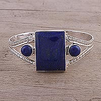 Lapis lazuli cuff bracelet, 'Crisscross Magic' - Lapis Lazuli and Sterling Silver Cuff Bracelet from India
