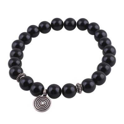 Onyx beaded stretch bracelet, 'Midnight Swirl' - Onyx and Silver Beaded Stretch Bracelet from India