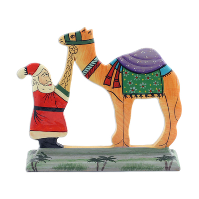 Wood decorative accents, 'Desert Santa' (pair) - Hand Carved Wood Decor Accents with Santa and Camel (Pair)