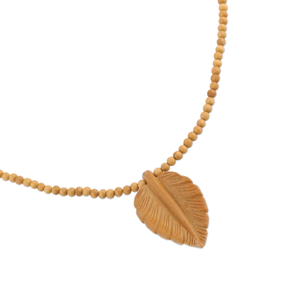 Wood pendant necklace, 'Mulberry Leaf' - Hand Carved Wood Beaded Leaf Pendant Necklace