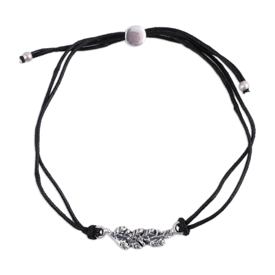Sterling silver pendant bracelet, 'Black Leaves in Winter' - Artisan Leaf Theme Black Cord Bracelet with Sterling Silver