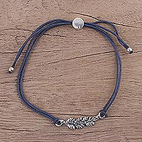 Sterling silver pendant bracelet, 'Blue Leaves in Winter' - India Dark Blue Cord Bracelet with Sterling Silver Leaves