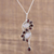 Garnet and rainbow moonstone pendant necklace, 'Sparkling Spiral' - Garnet and Rainbow Moonstone Pendant Necklace from India