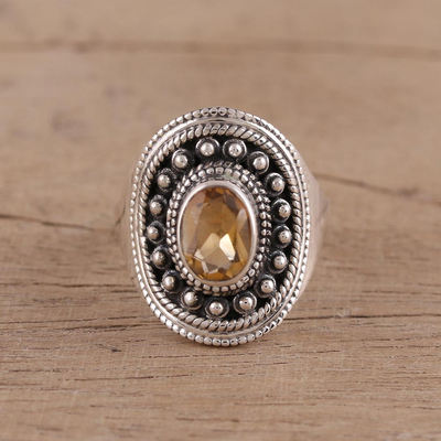 Citrine cocktail ring, 'Sparkling Shield' - Oval Citrine and Sterling Silver Cocktail Ring from India