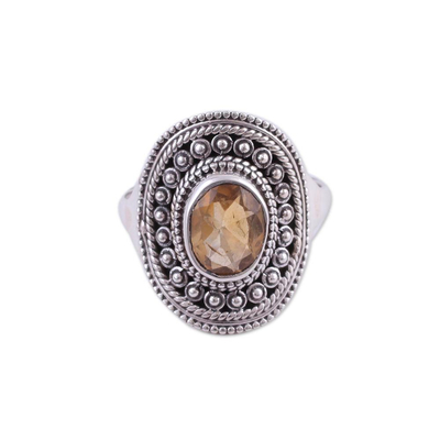 Citrine cocktail ring, 'Sparkling Shield' - Oval Citrine and Sterling Silver Cocktail Ring from India