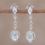 Rhodium plated blue topaz dangle earrings, 'Glacial Luster' - Blue Topaz Rhodium Plated Sterling Silver Dangle Earrings