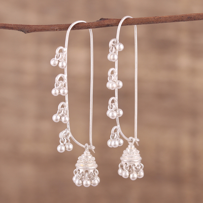 Sterling silver dangle earrings, 'Radiant Chimes' - Hand Crafted Sterling Silver Dangle Earrings from India