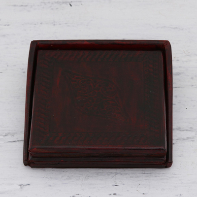 Leather coasters, 'Leafy Intrigue' (set of 4) - Embossed Leather Coasters from India (Set of 4)