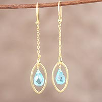 Gold plated blue topaz dangle earrings, 'Shining Eye' - Handmade Blue Topaz 22k Gold Plated Sterling Silver Earrings