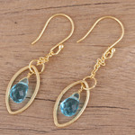 Gold plated blue topaz dangle earrings, 'Shining Eye' - Handmade Blue Topaz 22k Gold Plated Sterling Silver Earrings
