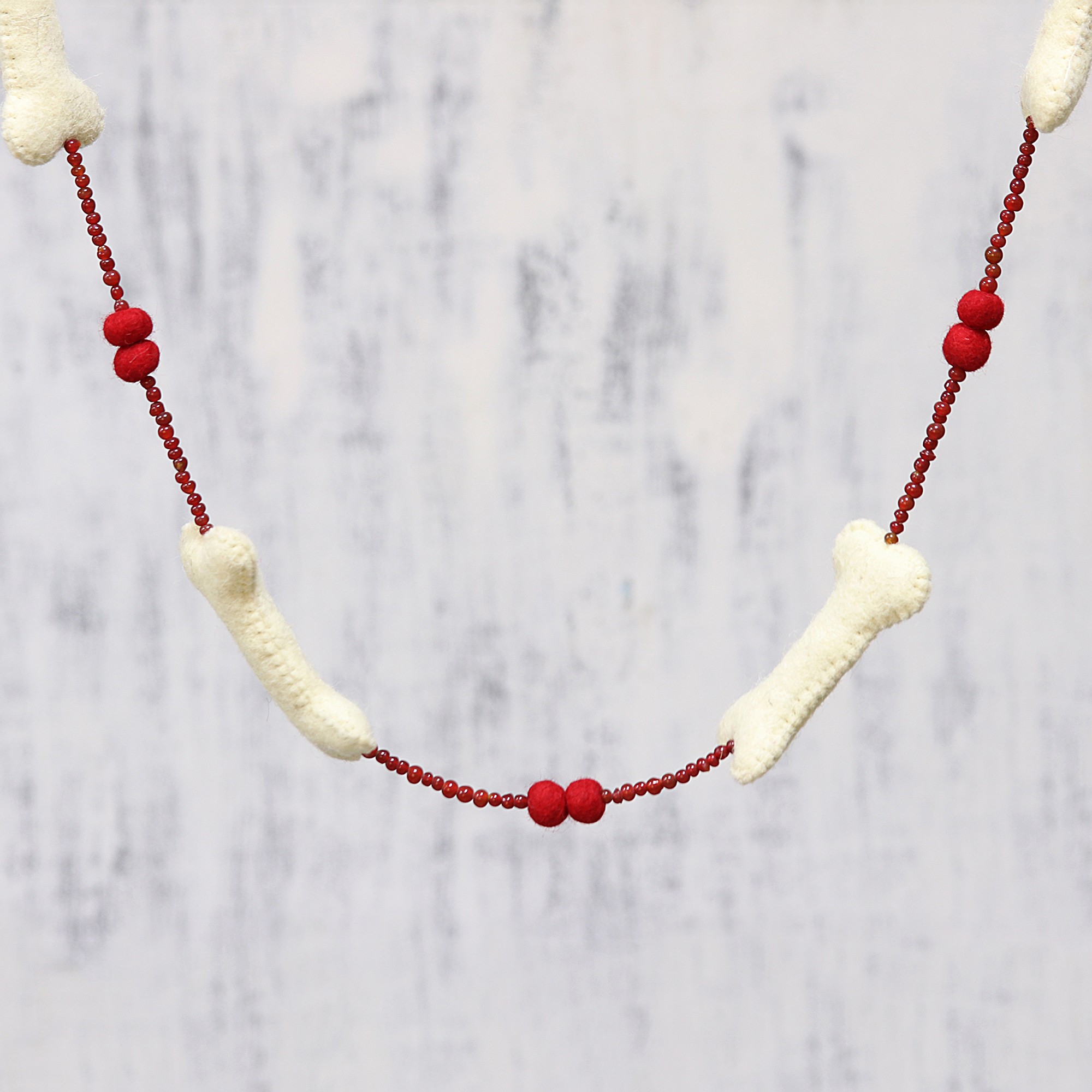 UNICEF Market Handcrafted Dog Bone Christmas Tree Garland from India