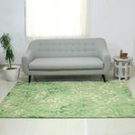 Hand-tufted wool area rug, 'Green Fascination' - Green Raised Abstract Pattern Hand Tufted Wool Area Rug