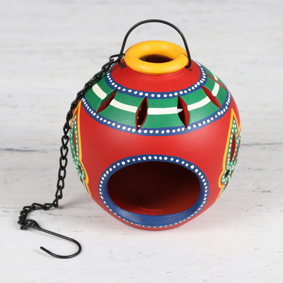 Keramischer Teelichthalter, „Festlicher Schein“. - Mehrfarbiger Keramik-Hänge-Teelichthalter aus Indien