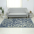 Hand-tufted wool area rug, 'Blue Majestic Garden' (5x8) - Blue and Grey Floral Wool Area Rug (5x8) from India thumbail