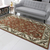 Hand-tufted wool area rug, 'Floral Persia' (5x8) - Brown and Ivory Floral Wool Area Rug (5x8) from India thumbail