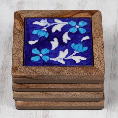 Ceramic and wood coasters, 'Dancing Midnight Blossoms' (set of 4) - Blue Floral Ceramic Coasters (Set of 4) from India