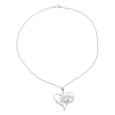 Sterling silver pendant necklace, 'Flower in the Heart' - Sterling Silver Heart and Floral Design Necklace from India