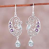 Blue topaz and amethyst dangle earrings, 'Elegant Flutter' - Handcrafted Amethyst and Blue Topaz Pendant Dangle Earrings