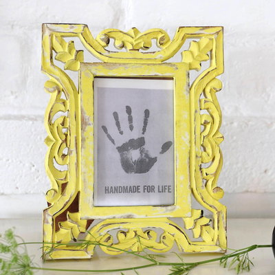 Wood photo frame, 'Sunlit Day' (4x6) - Distressed Yellow Hand Carved Mango Wood Photo Frame (4x6)