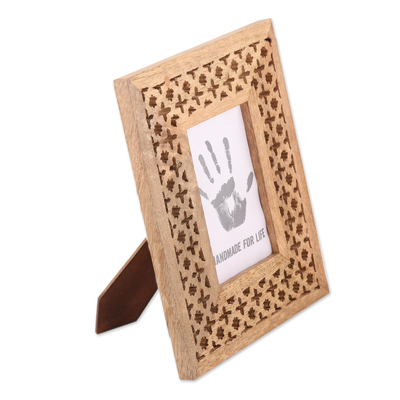 Wood photo frame, 'Starry Blossoms' (4x6) - Hand-Carved Mango Wood Starry Blossoms Photo Frame 4x6