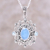 Blue topaz and chalcedony pendant necklace, 'Glowing Heaven' - Blue Topaz and Chalcedony Pendant Necklace from India