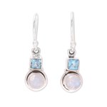 Blue topaz and rainbow moonstone dangle earrings, 'Sky Glimmer' - Blue Topaz and Rainbow Moonstone Dangle Earrings from India