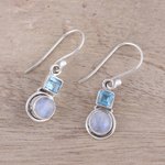 Blue topaz and rainbow moonstone dangle earrings, 'Sky Glimmer' - Blue Topaz and Rainbow Moonstone Dangle Earrings from India