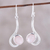 Rose quartz dangle earrings, 'Cool Sabarmati' - Rose Quartz Ovals Set In Sterling Silver Arc Dangle Earrings (image 2) thumbail