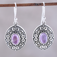 Amethyst dangle earrings, 'Swirling Ellipse' - Swirl Motif Oval Amethyst Dangle Earrings from India