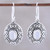 Rainbow moonstone dangle earrings, 'Swirling Ellipse' - Swirl Motif Rainbow Moonstone Dangle Earrings from India