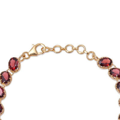Gold plated garnet tennis-style bracelet, 'Regal Garland' - Gold Plated 20-Carat Garnet Tennis-Style Bracelet from India