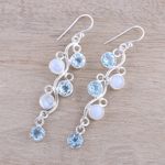 Blue topaz and rainbow moonstone dangle earrings, 'Morning Climber' - Blue Topaz and Rainbow Moonstone Earrings from India