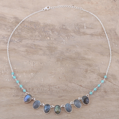 Labradorite and chalcedony pendant necklace, 'Enchanting Mystery' - Faceted Oval Labradorite and Chalcedony Pendant Necklace