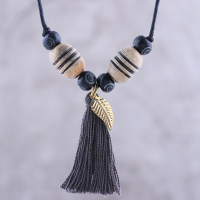 Bone and horn beaded pendant necklace, 'Rustic Fusion' - Bone and Horn Leaf Pendant Necklace from India