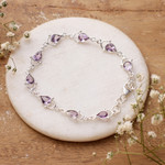 Amethyst link bracelet, 'Teardrop Tendrils' - Sterling Silver and Purple Faceted Amethyst Link Bracelet