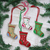 Wool felt ornaments, 'Christmas Charm' (set of 4) - Embroidered Wool Stocking Ornaments from India (Set of 4)