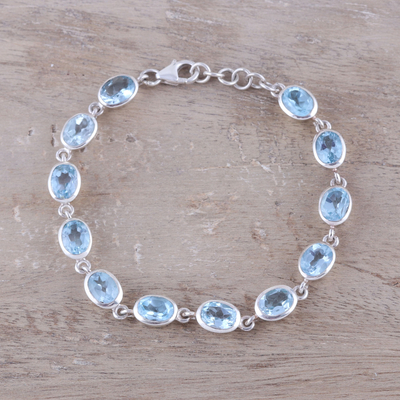 Blue topaz link bracelet, 'Sea Luster' - 18-Carat Blue Topaz Link Bracelet Crafted in India