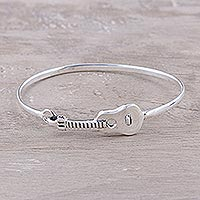 Sterling silver bangle bracelet, 'Music Gleams'