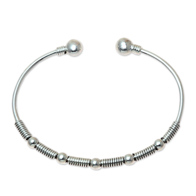 Sterling silver cuff bracelet, 'Heavenly Orbs' - Orb Pattern Sterling Silver Cuff Bracelet from India