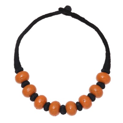 Bone beaded necklace, 'Shining Sand' - Brown Buffalo Bone Bead on Black Cotton Cord Necklace