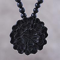 Ebony wood beaded pendant necklace, 'Vibrant Marigold' - Hand-Carved Marigold Ebony Wood Beaded Pendant Necklace