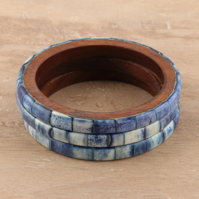 Bone and mango wood bangle bracelets, 'Blue Saga' (set of 3) - Blue Bone and Mango Wood Bangle Bracelets (Set of 3)