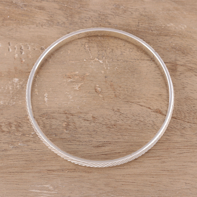 Sterling silver bangle bracelet, 'Herringbone Gleam' - Herringbone Pattern Sterling Silver Bangle Bracelet