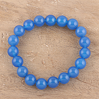 Chalcedony beaded stretch bracelet, 'Lustrous Orbs' - Blue Chalcedony Beaded Stretch Bracelet from India