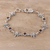 Amethyst link bracelet, 'Turtle Essence' - Amethyst Turtle Dangle Earrings from India