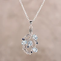 Rhodium plated blue topaz and sapphire pendant necklace, Glittering Blue